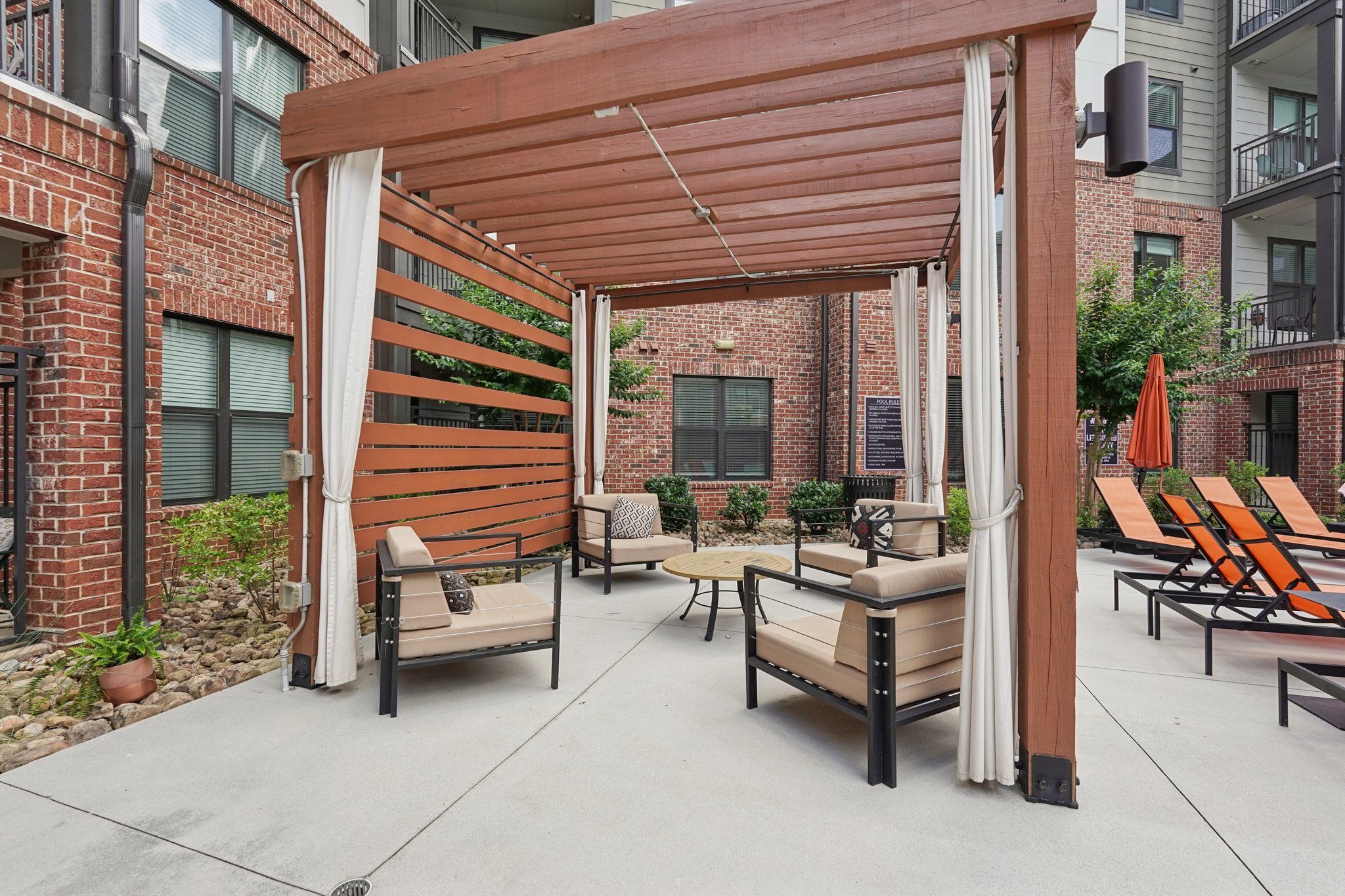 Pool cabanas with chairs